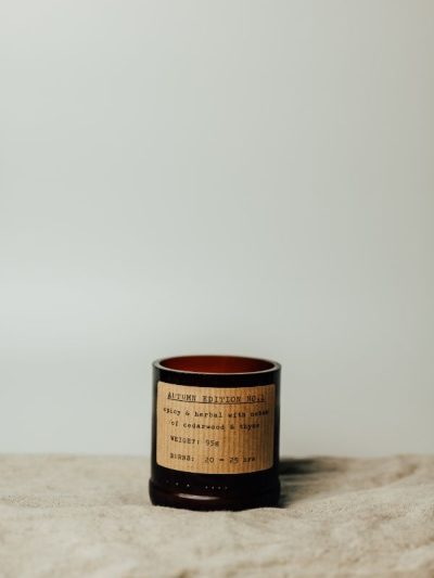 blank background with amber autumn scented candles