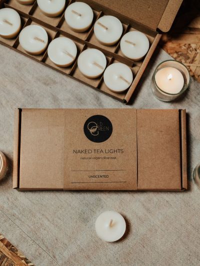 Tea lights in a box with another box open to show the reusable tea lights